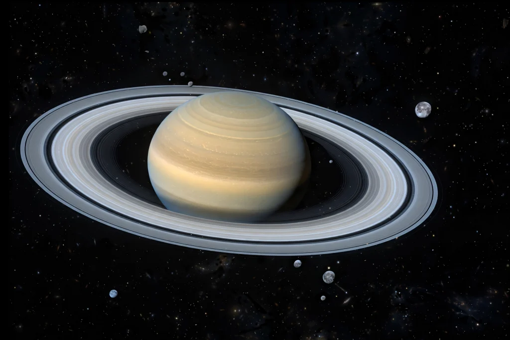 A Hidden Swarm Around Saturn Takes Its Moons to 274 Saturn and its rings surrounded by many small moons in deep space